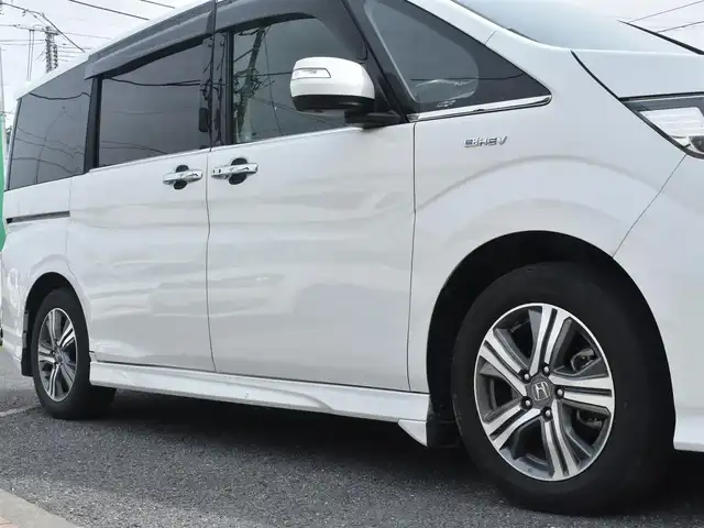 ホンダ ステップワゴン スパーダ eHEV G EXホンダS 神奈川県 2021(令3)年 7.5万km プラチナホワイトパール ナビ装着用スペシャルパッケージ＋ETC2.0車載器(ナビ連動)/マルチビューカメラシステム/Honda SENSING/1列目シート用i-サイドエアバッグシステム＋サイドカーテンエアバッグシステム(1-3列目シート対応)/わくわくゲート/トリプルゾーンコントロール・フルオートエアコンディショナー/16インチアルミホイール/専用インテリア/本革シート/運転席＆助手席シートヒーター/AC電源1500W/パフォーマンスダンパー純正メモリナビ/フルセグテレビ/全方位カメラ/後席モニター/両側パワースライドドア/スマートミラー/ETC2.0/LEDヘッドライト/ドライブレコーダー前後/取説/ナビ説/記録(R.4.5.6)/スペアスマートキー