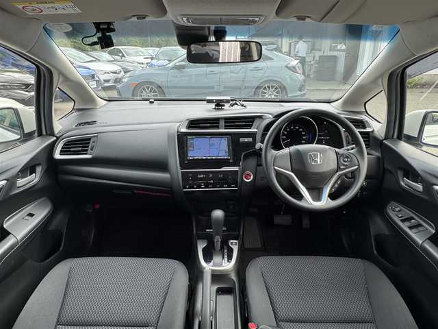 ホンダ フィット 13G F 兵庫県 2019(令1)年 1.5万km タフタホワイトⅢ ホンダセンシング/社外メモリーナビ/Bluetooth接続可/レーダークルコン/プッシュスタート/スマートキー×2あります/ビルトインETC