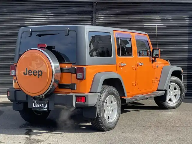 クライスラー・ジープ ジープ ラングラー アンリミテッド オレンジ 静岡県 2013(平25)年 5.8万km オレンジ 70台限定車/社外ナビ/(CD/DVD/iPod/AM/FM/フルセグ)/クルーズコントロール/ESC/HDC/バックカメラ/サイドモニター/純正17インチアルミホイール/純正フロアマット/サイドミラーヒーター/ドアバイザー/オートライト/リモコンキー/ETC/保証書/取扱説明書