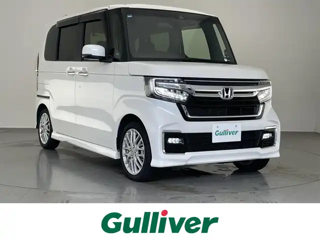 ホンダ Ｎ ＢＯＸ カスタム L ターボ 愛知県 2022(令4)年 1.5万km プラチナホワイトパール 社外ナビ　シートヒーター　禁煙車　ホンダセンシング　Ｂｌｕｅｔｏｏｔｈ　フルセグ　ＤＶＤ　前後ドラレコ　ＥＴＣ　両側パワスラ　衝突軽減　追従クルコン　ＬＥＤオートライト　黒ハーフレザー　パドルシフト