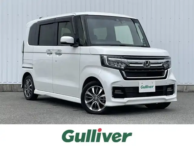 ホンダ Ｎ ＢＯＸ カスタム L 福岡県 2022(令4)年 1.2万km プラチナホワイトパール 衝突軽減ブレーキ　/左側パワースライドドア　/バックカメラ　/レーダークルーズコントロール　/ホンダセンシング　/前席シートヒーター　/社外メモリナビ（ＭＤＶ－Ｓ７０８Ｌ）　/ＥＴＣ　/純正１４インチアルミホイール