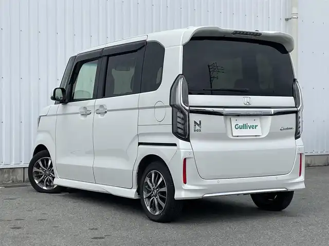 ホンダ Ｎ ＢＯＸ カスタム L 福岡県 2022(令4)年 1.2万km プラチナホワイトパール 衝突軽減ブレーキ　/左側パワースライドドア　/バックカメラ　/レーダークルーズコントロール　/ホンダセンシング　/前席シートヒーター　/社外メモリナビ（ＭＤＶ－Ｓ７０８Ｌ）　/ＥＴＣ　/純正１４インチアルミホイール