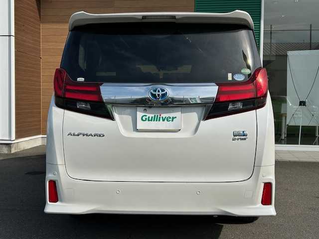 トヨタ アルファードハイブリット SR 静岡県 2017(平29)年 9.9万km ホワイトパールクリスタルシャイン ワンオーナー/純正メモリナビ/AM/FM/CD/DVD/BT/フルセグ/バックカメラ/フリップダウンモニター/両側パワースライドドア/純正フロアマット/クルーズコントロール/オートホールド/パワーバックドア/ビルトイン2.0ETC/ハーフレザーシート/オットマン（助手席・セカンドシート）