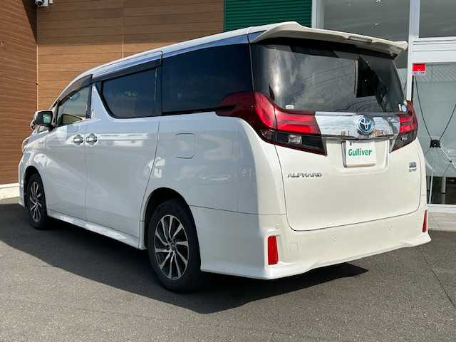 トヨタ アルファードハイブリット SR 静岡県 2017(平29)年 9.9万km ホワイトパールクリスタルシャイン ワンオーナー/純正メモリナビ/AM/FM/CD/DVD/BT/フルセグ/バックカメラ/フリップダウンモニター/両側パワースライドドア/純正フロアマット/クルーズコントロール/オートホールド/パワーバックドア/ビルトイン2.0ETC/ハーフレザーシート/オットマン（助手席・セカンドシート）