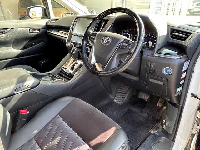 トヨタ アルファードハイブリット SR 静岡県 2017(平29)年 9.9万km ホワイトパールクリスタルシャイン ワンオーナー/純正メモリナビ/AM/FM/CD/DVD/BT/フルセグ/バックカメラ/フリップダウンモニター/両側パワースライドドア/純正フロアマット/クルーズコントロール/オートホールド/パワーバックドア/ビルトイン2.0ETC/ハーフレザーシート/オットマン（助手席・セカンドシート）