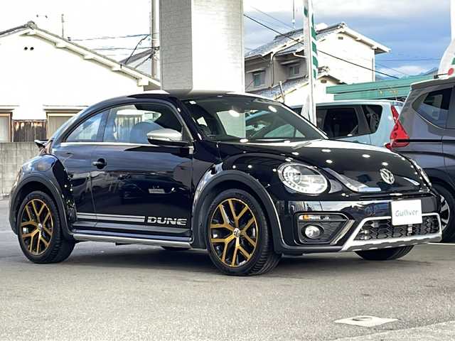 フォルクスワーゲン ザ・ビートル デューン 愛媛県 2018(平30)年 4.3万km 黒 純正ナビ/フルセグＴＶ/Bluetooth/ＣＤ／ＤＶＤ/ＦＭ／ＡＭ/バックカメラ/ＥＴＣ/ステアリングスイッチ/パドルシフト/ブラインドスポットモニター/ハーフレザーシート/純正１８インチアルミホイール/オートライト/スマートキー/プッシュスタート