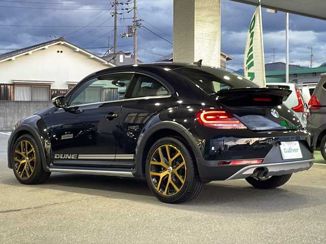 フォルクスワーゲン ザ・ビートル デューン 愛媛県 2018(平30)年 4.3万km 黒 純正ナビ/フルセグＴＶ/Bluetooth/ＣＤ／ＤＶＤ/ＦＭ／ＡＭ/バックカメラ/ＥＴＣ/ステアリングスイッチ/パドルシフト/ブラインドスポットモニター/ハーフレザーシート/純正１８インチアルミホイール/オートライト/スマートキー/プッシュスタート