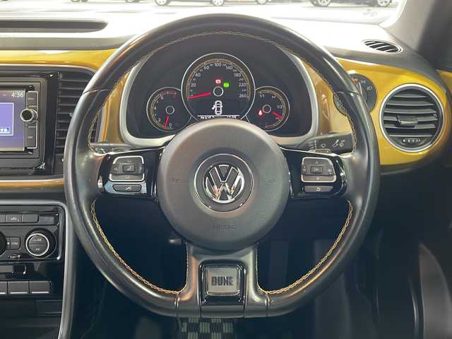 フォルクスワーゲン ザ・ビートル デューン 愛媛県 2018(平30)年 4.3万km 黒 純正ナビ/フルセグＴＶ/Bluetooth/ＣＤ／ＤＶＤ/ＦＭ／ＡＭ/バックカメラ/ＥＴＣ/ステアリングスイッチ/パドルシフト/ブラインドスポットモニター/ハーフレザーシート/純正１８インチアルミホイール/オートライト/スマートキー/プッシュスタート