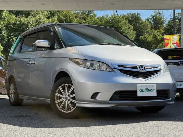 ホンダ エリシオン G プレミアム 大阪府 2005(平17)年 13万km サテンシルバーメタリック /禁煙車//純正HDDナビ//CD・DVD・アナログTV//バックカメラ//ETC//ウッドレザーコンビステアリング//ウッド調パネル//オートライト//HIDヘッドライト//片側パワースライドドア//社外16AW//保証書//取扱説明書