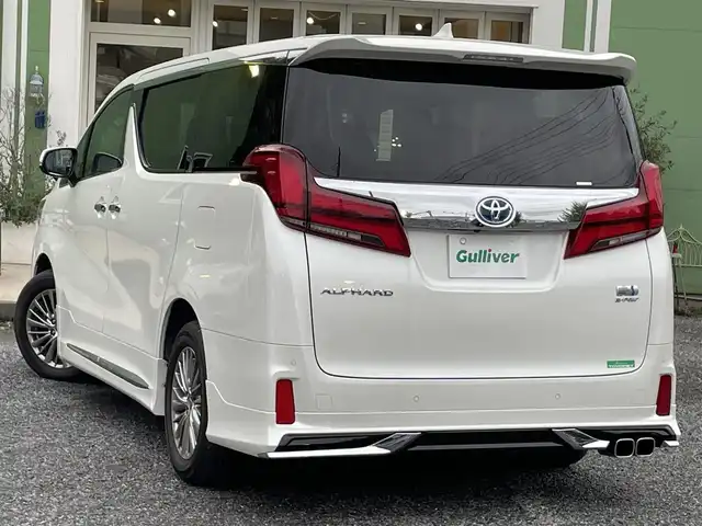 トヨタ アルファードハイブリット SR Cパッケージ 埼玉県 2021(令3)年 2.2万km ホワイトパールクリスタルシャイン モデリスタエアロ/検査時21.339km/純正9型ナビTV/純正フリップダウンモニター/バックカメラ/デジタルインナーミラー/前方ドライブレコーダー/レザーシート/1.2列目パワーシート/エアシート＆シートヒーター/ハンドルヒーター/助手席、２列目　オットマン/パワーバックドア/両側パワースライドドア/セーフティセンス/レーダークルーズコントロール/LEDヘッドライト/ETC 2.0/AC100V　１５００Wｘ２/プッシュスタート/保証書付整備手帳/取扱説明書