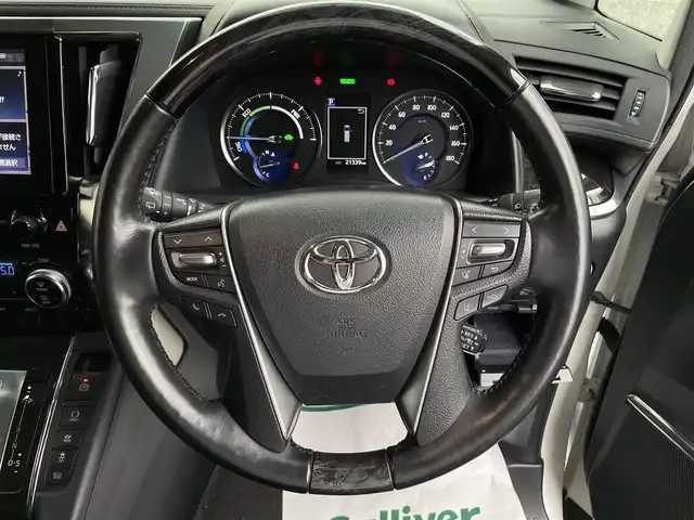 トヨタ アルファードハイブリット SR Cパッケージ 埼玉県 2021(令3)年 2.2万km ホワイトパールクリスタルシャイン モデリスタエアロ/検査時21.339km/純正9型ナビTV/純正フリップダウンモニター/バックカメラ/デジタルインナーミラー/前方ドライブレコーダー/レザーシート/1.2列目パワーシート/エアシート＆シートヒーター/ハンドルヒーター/助手席、２列目　オットマン/パワーバックドア/両側パワースライドドア/セーフティセンス/レーダークルーズコントロール/LEDヘッドライト/ETC 2.0/AC100V　１５００Wｘ２/プッシュスタート/保証書付整備手帳/取扱説明書