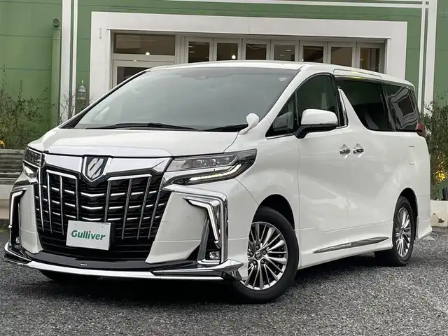 トヨタ アルファードハイブリット SR Cパッケージ 埼玉県 2021(令3)年 2.2万km ホワイトパールクリスタルシャイン モデリスタエアロ/検査時21.339km/純正9型ナビTV/純正フリップダウンモニター/バックカメラ/デジタルインナーミラー/前方ドライブレコーダー/レザーシート/1.2列目パワーシート/エアシート＆シートヒーター/ハンドルヒーター/助手席、２列目　オットマン/パワーバックドア/両側パワースライドドア/セーフティセンス/レーダークルーズコントロール/LEDヘッドライト/ETC 2.0/AC100V　１５００Wｘ２/プッシュスタート/保証書付整備手帳/取扱説明書