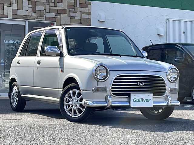 ダイハツ ミラ ジーノ 徳島県 2001(平13)年 4.4万km シルバーメタリック ドアバイザー/リヤデフォッガー/純正フロアマット/AM/FM/CD/MD/ハロゲンヘッドライト/NEXCTA 13インチアルミホイール/スペアキー/取扱説明書/新車時保証書