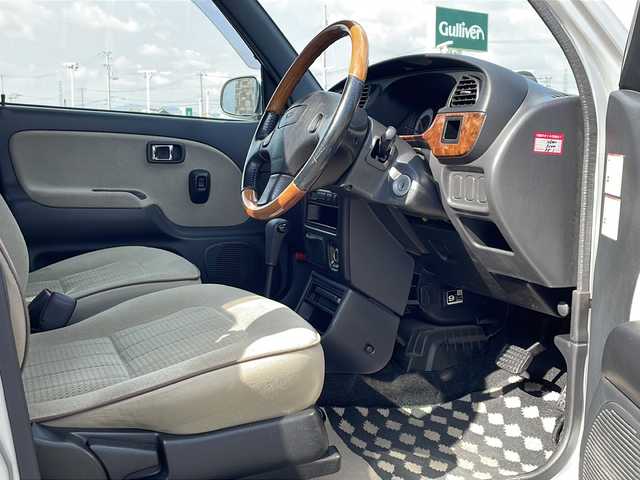 ダイハツ ミラ ジーノ 徳島県 2001(平13)年 4.4万km シルバーメタリック ドアバイザー/リヤデフォッガー/純正フロアマット/AM/FM/CD/MD/ハロゲンヘッドライト/NEXCTA 13インチアルミホイール/スペアキー/取扱説明書/新車時保証書