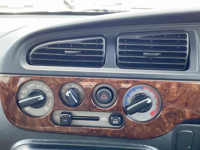 ダイハツ ミラ ジーノ 徳島県 2001(平13)年 4.4万km シルバーメタリック ドアバイザー/リヤデフォッガー/純正フロアマット/AM/FM/CD/MD/ハロゲンヘッドライト/NEXCTA 13インチアルミホイール/スペアキー/取扱説明書/新車時保証書