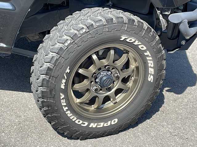 スズキ ジムニー XC 長野県 2018(平30)年 3.3万km ブルーイッシュブラックパール3 リフトアップ/社外16インチアルミ/オープンカントリーTOYOタイヤ/社外バンパー/レーダーブレーキサポート/8インチメモリナビフルセグTV/バックカメラ/ETC/社外レザー調シートカバー/LEDヘッドライト/保証書・スペアキー/社外フロアマット