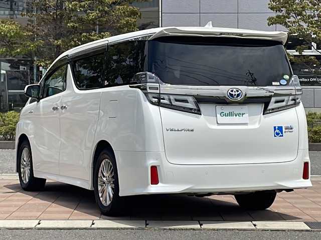 トヨタ ヴェルファイア ハイブリット ZR サイドリフトアップ 福島県 2018(平30)年 5.1万km ホワイトパールクリスタルシャイン 純正ナビゲーション/【CD/SD/USB/AUX/BT/TV】/アラウンドビューモニター/フリップダウンモニター/デジタルインナーミラー/JBLプレミアムサウンドシステム/ビルトインETC/ドライブレコーダー/前席シートヒーター/前席ベンチレーション/前席パワーシート/運転席シートメモリー/助手席オットマン/セカンド右シートオットマン/両側電動スライドドア/ブラインドスポット/純正フロアマット/ドアバイザー