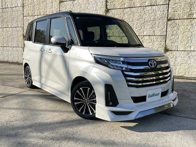 トヨタ ルーミー カスタムG－T 長崎県 2025(令7)年 0.1千km ブラックマイカメタリック/パールホワイト2トーン ワンオーナー/モデリスタエアロ（F/S/R下）/純正ディスプレイオーディオ/（Bluetooth/フルセグ）/全方位カメラ/衝突軽減システム/レーンアシスト/レーダークルーズ/両側パワースライドドア/電動格納ミラー/オートライト/スマートキー/プッシュスタート/純正15インチAW