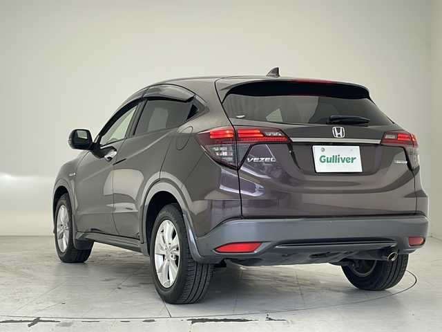 ホンダ ヴェゼル ハイブリッド X ホンダセンシング 沖縄県 2018(平30)年 4.3万km オーロラアメジストメタリック 純正ナビ【ＶＸＭ－１８４ＶＦｉ】/　フルセグＴＶ　Ｂｌｕｅｔｏｏｔｈ　ＣＤ　ＤＶＤ　ＡＭ　ＦＭ/ＵＳＢ入力端子　/バックカメラ　/ＥＴＣ　/ドライブレコーダー　/クルーズコントロール/スマートキー　/ステアリングスイッチ/アイドリングストップ　/ＬＥＤヘッドライト/オートライト/純正アルミホイール　/純正フロアマット