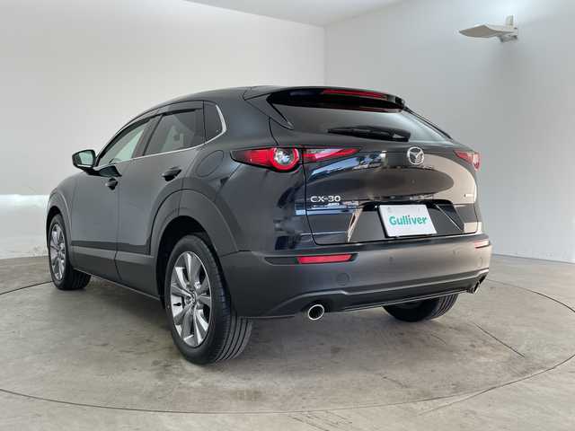 マツダ ＣＸ－３０ XD Lパッケージ 兵庫県 2021(令3)年 2万km ジェットブラックマイカ ・4WD/・ワンオーナー/・i-ACTIVSENSE/・車間制御/・速度標識検知/・ドライバーモニタリング/・前側方接近車両検知/・後側方接近車両検知/・車線逸脱警報システム/・BSM/・レーンキープアシスト/・ディスタンス＆スピードアラート/・スマートブレーキサポート/・スマートブレーキサポート（後進時）/・前後コーナーセンサー/・レーダークルーズコントロール/・オートマチックハイビーム/・純正ナビ＆フルセグ＆BT＆DVD＆HDMI/・全方位カメラ/・HUD/・黒革シート/・前席シートヒーター/・運転席パワーシート/・運転席メモリーシート/・ステアリングヒーター/・ステアリングリモコン/・純正前後ドライブレコーダー/・ビルトインETC/・スマートキー/・スペアキー/・プッシュスタート/・LEDヘッドライト/・フォグ/・オートライト/・純正18インチアルミホイール/・トノカバー