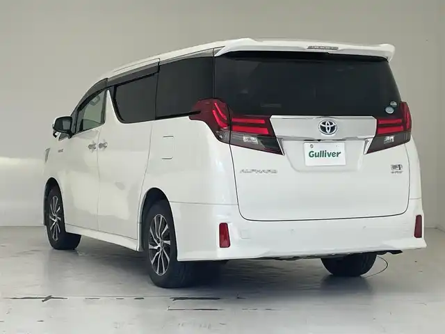 トヨタ アルファードハイブリット SR Cパッケージ 沖縄県 2016(平28)年 8.9万km ホワイトパールクリスタルシャイン 純正ナビ（NSZT-ZA4T）/（CD/DVD/フルセグTV/Bluetooth/USB/HDMI）/バックカメラ/ETC/ドライブレコーダー/フリップダウンモニター/トヨタセーフティセンス/クルーズコントロール/両側パワースライドドア/パワーシート/シートヒーター/レザーシート/オットマン/LEDヘッドライト/オートライト/純正フロアマット/プッシュスタート/スマートキー/純正17インチアルミホイール/ドアバイザー