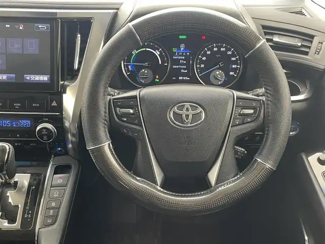 トヨタ アルファードハイブリット SR Cパッケージ 沖縄県 2016(平28)年 8.9万km ホワイトパールクリスタルシャイン 純正ナビ（NSZT-ZA4T）/（CD/DVD/フルセグTV/Bluetooth/USB/HDMI）/バックカメラ/ETC/ドライブレコーダー/フリップダウンモニター/トヨタセーフティセンス/クルーズコントロール/両側パワースライドドア/パワーシート/シートヒーター/レザーシート/オットマン/LEDヘッドライト/オートライト/純正フロアマット/プッシュスタート/スマートキー/純正17インチアルミホイール/ドアバイザー