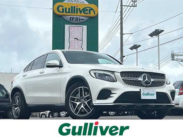 メルセデス・ベンツ ＧＬＣ２２０ d 4マチック クーペ スポーツ 山口県 2018(平30)年 3.5万km パール メーカーSDナビ/（CD.DVD.BT.フルセグ）/アラウンドビューモニター/パドルシフト/パワーシート/シートヒーター全席/運転席メモリーシート/オートLEDライト/ビルトインETC/ヘッドアップディスプレイ/レーダーセーフティパッケージ/　・ブラインドスポットモニター/　・ステアリングアシスト/　・クルーズコントロール/　・衝突軽減ブレーキ/純正ドラレコ/純正フロアマット/リアエンターテイメント社外/ワイヤレス給電/スマートキー/プッシュスタート