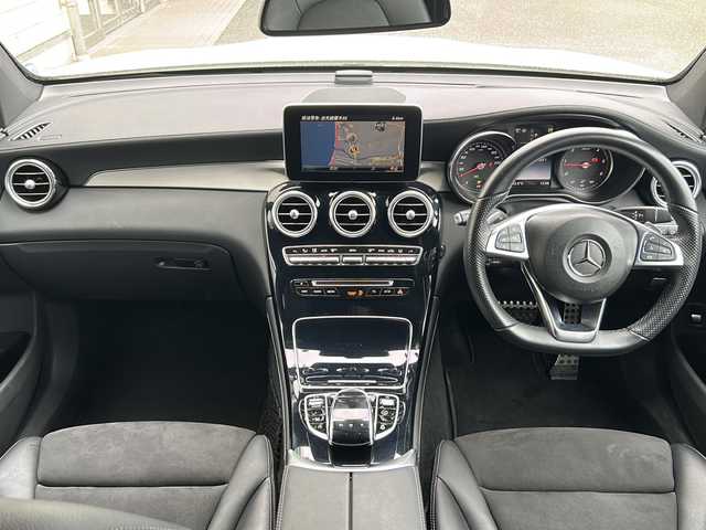 メルセデス・ベンツ ＧＬＣ２２０ d 4マチック クーペ スポーツ 山口県 2018(平30)年 3.5万km パール メーカーSDナビ/（CD.DVD.BT.フルセグ）/アラウンドビューモニター/パドルシフト/パワーシート/シートヒーター全席/運転席メモリーシート/オートLEDライト/ビルトインETC/ヘッドアップディスプレイ/レーダーセーフティパッケージ/　・ブラインドスポットモニター/　・ステアリングアシスト/　・クルーズコントロール/　・衝突軽減ブレーキ/純正ドラレコ/純正フロアマット/リアエンターテイメント社外/ワイヤレス給電/スマートキー/プッシュスタート