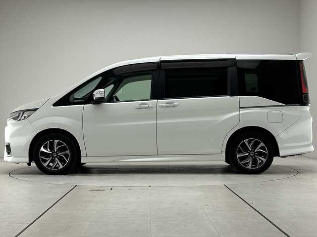 ホンダ ステップワゴン スパーダ ホンダセンシング 愛知県 2019(平31)年 3.3万km プラチナホワイトパール 純正ナビ/フリップダウンモニター/両側パワースライドドア/レーダークルーズコントロール/バックカメラ/純正アルミホイール/ＥＴＣ/LEDヘッドライト/パドルシフト/レーンキープアシスト/ドライブレコーダー/衝突軽減システム/フルセグ/CD DVD/Bluetooth/ステアリングスイッチ/スマートキー/プッシュスタート