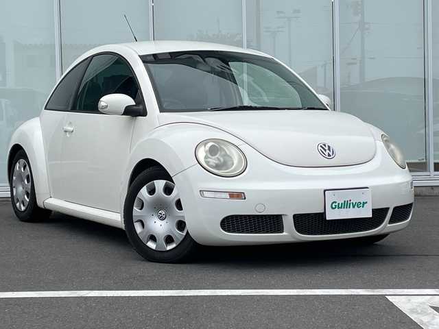 フォルクスワーゲン ニュー ビートル EZ 神奈川県 2006(平18)年 11万km 白 純正オーディオ/レザー調シートカバー/ETC/ウィンカーミラー