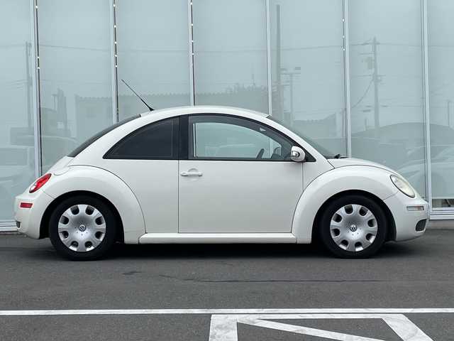 フォルクスワーゲン ニュー ビートル EZ 神奈川県 2006(平18)年 11万km 白 純正オーディオ/レザー調シートカバー/ETC/ウィンカーミラー