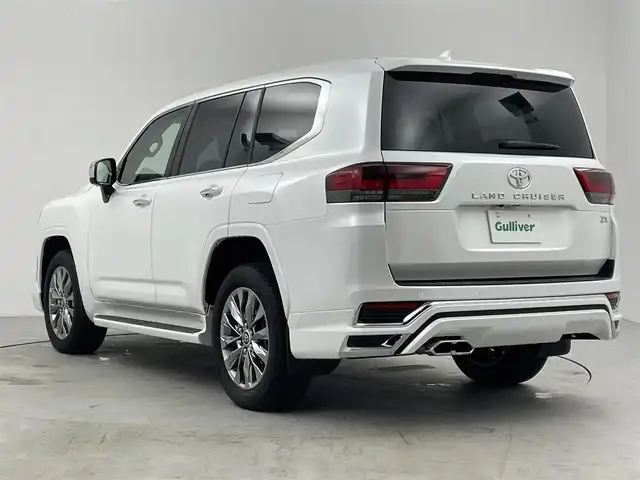 トヨタ ランドクルーザー ZX 愛知県 2024(令6)年 0.9万km プレシャスホワイトパール 純正12.3型メモリナビ/フルセグTV/BT/CD/DVD/USB/AppleCarPlay/AndroidAuto/パノラミックビューモニター/電動ムーンルーフ/JBLサウンド/モデリスタエアロ/本革シート/シートヒーター＆ベンチレーション　D/N/2列目席/パワーシート　D/N席/COOLBOX/360°ドライブレコーダー/ビルトインETC2.0/HUD/トヨタセーフティセンス/PCS/LTA/LDA/BSM/PKSB/ACC/RCTA/RCD/RSA/AHB/先行車発進告知/パワーバックドア/AC100V/サイドステップ/3列目電動格納シート/革・杢目調コンビステアリング/ステアリングスイッチ/ステアリングヒーター/スマートキー＆プッシュスタート/DAC（ダウンヒルアシスト/MTS（マルチテレインセレクト/電動パーキング/オートブレーキホールド/3眼LEDオートライト/フォグランプ/シーケンシャルターンランプ/サイドステップ/充電用USBポート/純正20インチAW/ラバーマット/スペアタイヤ
