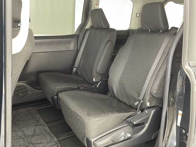 トヨタ ヴォクシー ZS 煌 沖縄県 2015(平27)年 7.1万km ブラッキッシュアゲハガラスフレーク 社外8インチナビ(ＭＤＶ－Ｘ８０２Ｌ)/(フルセグＴＶ　Ｂｌｕｅｔｏｏｔｈ　ＣＤ　ＤＶＤ)　/両側パワースライドドア　/バックカメラ　/ビルトインＥＴＣ　　/ステアリングスイッチ/アイドリングストップ　/スマートキー/プッシュスタート/ＬＥＤヘッドライト　/オートライト　/純正16インチアルミホイール/純正フロアマット/横滑り防止装置/ドアバイザー