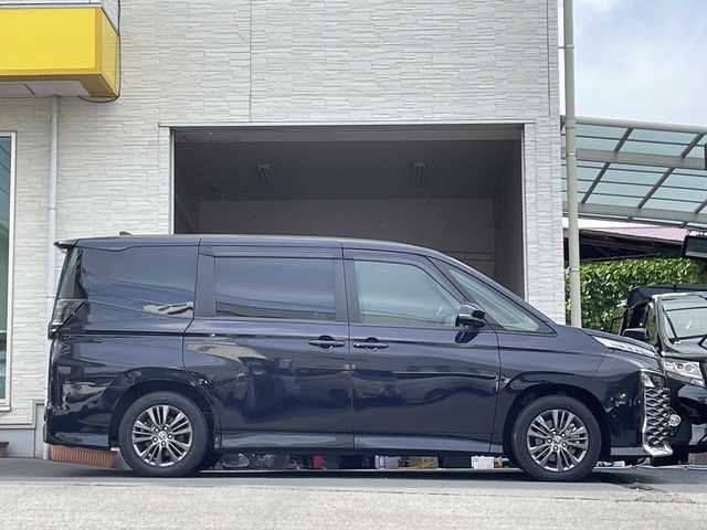 トヨタ ヴォクシー ハイブリッド S－G 大分県 2023(令5)年 0.4万km ダークグレーM/クリスタルシルバーM 両側パワースライドドア /全方位カメラ/純正10.5インチアルミホイール/フルセグTV/Bluetooth/純正16インチアルミホイール/純正ビルトインETC/純正LEDヘッドライト/オートライト/オートマチックハイビーム/衝突被害軽減ブレーキ/横滑り防止装置/コーナーセンサー/シートヒーター/スペアキー