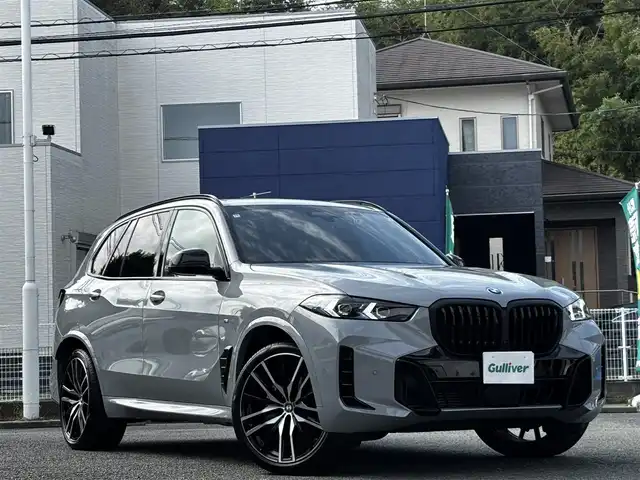 ＢＭＷ ＢＭＷ Ｘ５ xDrive 40d Mスポーツ 熊本県 2024(令6)年 1.1万km グレー カラーコード：C4P/サンルーフ/純正ディスプレイオーディオナビ/【フルセグTV/BT】/全方位カメラ/harman/kardon/衝突軽減ブレーキ/車線逸脱警報/コーナーセンサー/アダプティブクルーズコントロール/ヘッドアップディスプレイ/ブラインドスポットモニター/前後ドライブレコーダー/ステアリングリモコン/パドルシフト/ステアリングヒーター/黒革シート/D/Nパワーシート/D/Nメモリシート/D/Nシートヒーター/D/Nシートクーラー/D/Nマッサージシート/置くだけ充電/保冷・保温付きドリンクホルダー/パワーバックドア/純正22インチアルミホイール/取扱説明書(車両)
