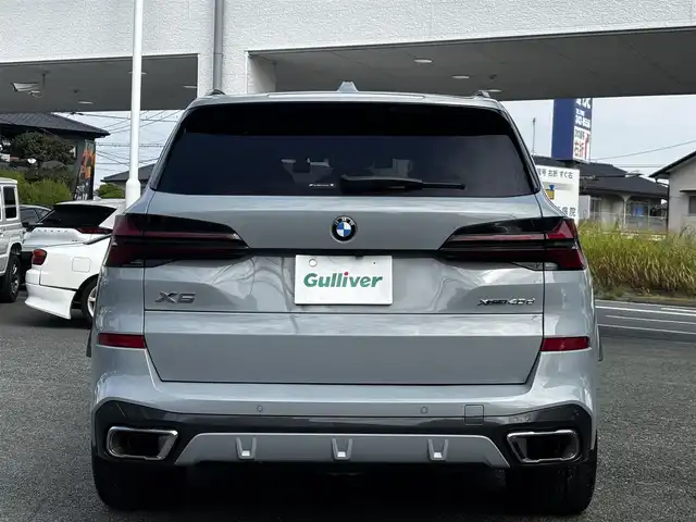 ＢＭＷ ＢＭＷ Ｘ５ xDrive 40d Mスポーツ 熊本県 2024(令6)年 1.1万km グレー カラーコード：C4P/サンルーフ/純正ディスプレイオーディオナビ/【フルセグTV/BT】/全方位カメラ/harman/kardon/衝突軽減ブレーキ/車線逸脱警報/コーナーセンサー/アダプティブクルーズコントロール/ヘッドアップディスプレイ/ブラインドスポットモニター/前後ドライブレコーダー/ステアリングリモコン/パドルシフト/ステアリングヒーター/黒革シート/D/Nパワーシート/D/Nメモリシート/D/Nシートヒーター/D/Nシートクーラー/D/Nマッサージシート/置くだけ充電/保冷・保温付きドリンクホルダー/パワーバックドア/純正22インチアルミホイール/取扱説明書(車両)