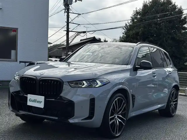 ＢＭＷ ＢＭＷ Ｘ５ xDrive 40d Mスポーツ 熊本県 2024(令6)年 1.1万km グレー カラーコード：C4P/サンルーフ/純正ディスプレイオーディオナビ/【フルセグTV/BT】/全方位カメラ/harman/kardon/衝突軽減ブレーキ/車線逸脱警報/コーナーセンサー/アダプティブクルーズコントロール/ヘッドアップディスプレイ/ブラインドスポットモニター/前後ドライブレコーダー/ステアリングリモコン/パドルシフト/ステアリングヒーター/黒革シート/D/Nパワーシート/D/Nメモリシート/D/Nシートヒーター/D/Nシートクーラー/D/Nマッサージシート/置くだけ充電/保冷・保温付きドリンクホルダー/パワーバックドア/純正22インチアルミホイール/取扱説明書(車両)