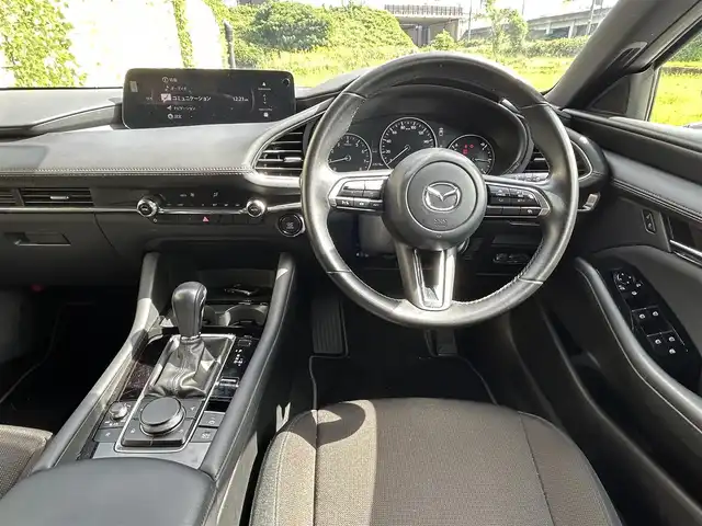 マツダ マツダ３ファストバック 15S ツーリング 長崎県 2024(令6)年 2.4万km ジェットブラックマイカ ワンオーナー/純正ディスプレイオーディオ/（Bluetooth/フルセグ）/AppleCarplay/AndroidAuto/全方位カメラ/衝突軽減システム/コーナーセンサー/レーンアシスト/ブラインドスポットモニター/レーダークルーズ/ETC/置くだけ充電/オートライト/純正18インチAW
