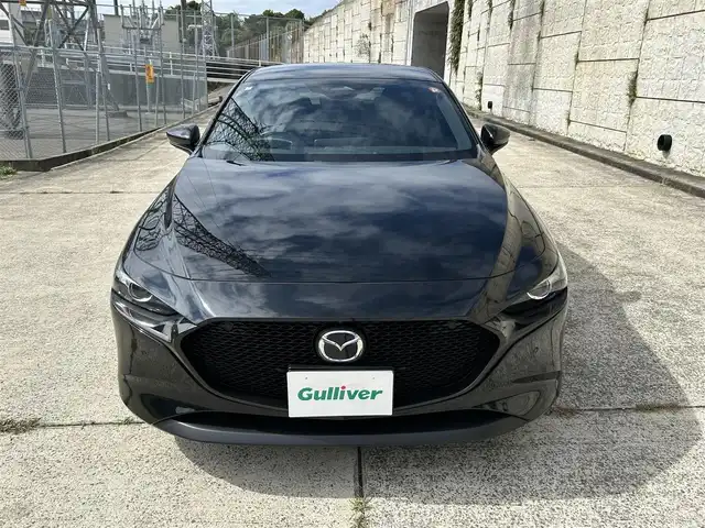マツダ マツダ３ファストバック 15S ツーリング 長崎県 2024(令6)年 2.4万km ジェットブラックマイカ ワンオーナー/純正ディスプレイオーディオ/（Bluetooth/フルセグ）/AppleCarplay/AndroidAuto/全方位カメラ/衝突軽減システム/コーナーセンサー/レーンアシスト/ブラインドスポットモニター/レーダークルーズ/ETC/置くだけ充電/オートライト/純正18インチAW