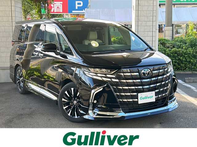 トヨタ アルファードハイブリット エグゼクティブ ラウンジ 東京都 2024(令6)年 1.5万km ブラック ワンオーナー/モデリスタエアロ/左右独立ムーンルーフ/アドバンストドライブ/アドバンストパーク/リアエンターテインメント/JBLサウンド/デジタルインナーミラー/ヘッドアップディスプレイ/パノラミックビューモニター/純正１４インチディスプレイオーディオ/CD/DVDデッキ/トヨタセーフティセンス/【プリクラッシュセーフティ・レーントレーシングアシスト・レーダークルーズコントロール・ブラインドスポットモニター・クリアランスソナー】/ビルトインETC2.0/シートヒーター・エアーシート・パワーシート/ステアリングヒーター/パワーバックドア/AC100V/両側パワースライドドア/置くだけ充電/新車保証書/スペアキー