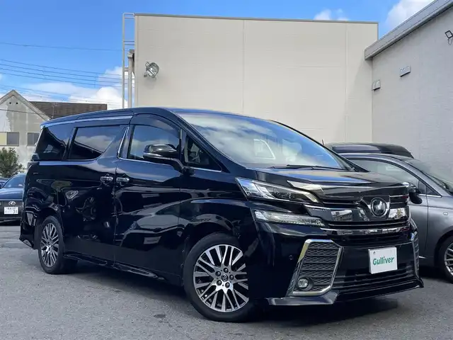 トヨタ ヴェルファイア Z Gエディション 和歌山県 2016(平28)年 3.6万km ブラック ワンオーナー/4WD/JBLプレミアムサウンド/純正メーカーナビ・フルセグTV・CD・DVD/　Bluetooth・USB・HDMI/純正フリップダウンモニター/全方位カメラ/両側パワースライドドア/レーダークルーズコントロール/PCS/パワーバックドア/前席パワーシート/2列目電動リクライニング・オットマン/ステアリングヒーター/フロントガラス熱線/LEDヘッドライト/スペアタイヤ/ドライブレコオーダー/スマートキー/スペアキー/保証書/取扱説明書/　