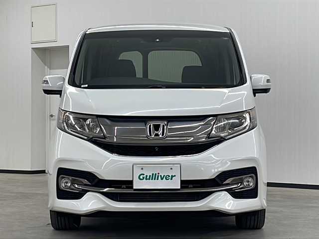 ホンダ ステップワゴン スパーダ クールスピリット 長崎県 2017(平29)年 7万km ホワイトオーキッドパール 純正メモリナビ/・AM/FM/CD/DVD/Bluetooth/・フルセグテレビ/フリップダウンモニター/両側パワースライド/ホンダセンシング/・衝突軽減ブレーキ/・車線逸脱警報/・先行車発進お知らせ機能/・レーンキープアシスト/・アダプティブクルーズコントロール/全方位カメラ/バックカメラ/シートヒーター（D席+N席）/LEDヘッドライト/ETC/ドライブレコーダー/ダブルエアコン/わくわくゲート/リアサンシェード/シートバックテーブル/パドルシフト/オートライト/純正17インチアルミホイル/ＨＤＭＩ端子/プッシュスタートボタン/スマートキー/スペアキー/純正フロアマット/純正バイザー/保証書/取扱説明書