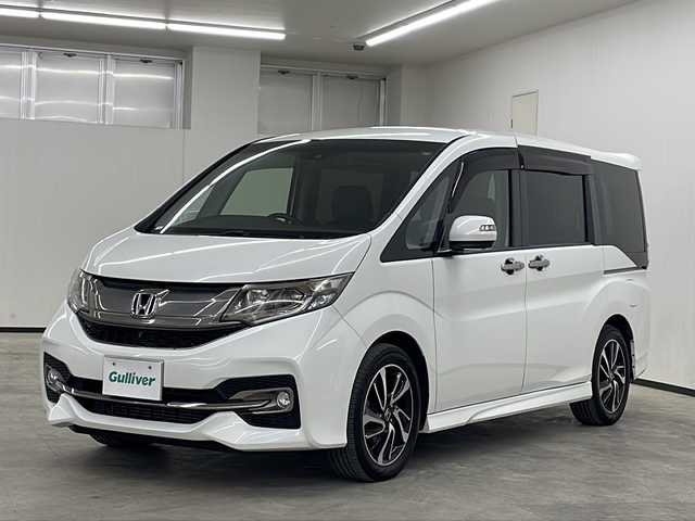 ホンダ ステップワゴン スパーダ クールスピリット 長崎県 2017(平29)年 7万km ホワイトオーキッドパール 純正メモリナビ/・AM/FM/CD/DVD/Bluetooth/・フルセグテレビ/フリップダウンモニター/両側パワースライド/ホンダセンシング/・衝突軽減ブレーキ/・車線逸脱警報/・先行車発進お知らせ機能/・レーンキープアシスト/・アダプティブクルーズコントロール/全方位カメラ/バックカメラ/シートヒーター（D席+N席）/LEDヘッドライト/ETC/ドライブレコーダー/ダブルエアコン/わくわくゲート/リアサンシェード/シートバックテーブル/パドルシフト/オートライト/純正17インチアルミホイル/ＨＤＭＩ端子/プッシュスタートボタン/スマートキー/スペアキー/純正フロアマット/純正バイザー/保証書/取扱説明書