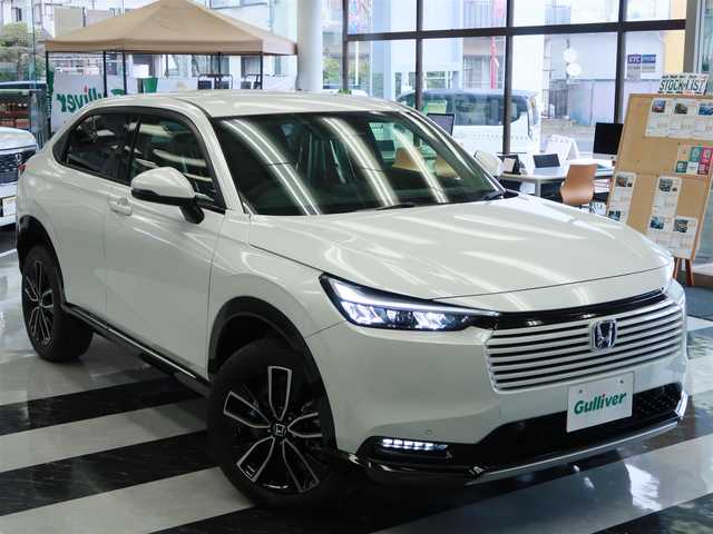 ホンダ ヴェゼル ハイブリッド e:HEV Z 千葉県 2025(令7)年 0.1千km プラチナホワイトパール 登録済未使用車/ホンダコネクトディスプレイ/ナビゲーション/フルセグTV/Bluetooth/AM/FM/USB/バックカメラ /BSM/ブラインドスポットモニター/LEDヘッドライト/LEDフォグランプ/ステアリングヒーター/ビルトインETC2.0/ハーフレザー /電動リアゲート/純正18インチAW/レーダークルーズコントロール/パドルシフト/ワイヤレス充電/USB充電/スマートキー×2本/取説/保証書