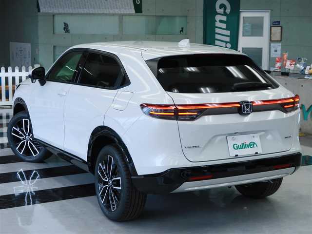 ホンダ ヴェゼル ハイブリッド e:HEV Z 千葉県 2025(令7)年 0.1千km プラチナホワイトパール 登録済未使用車/ホンダコネクトディスプレイ/ナビゲーション/フルセグTV/Bluetooth/AM/FM/USB/バックカメラ /BSM/ブラインドスポットモニター/LEDヘッドライト/LEDフォグランプ/ステアリングヒーター/ビルトインETC2.0/ハーフレザー /電動リアゲート/純正18インチAW/レーダークルーズコントロール/パドルシフト/ワイヤレス充電/USB充電/スマートキー×2本/取説/保証書
