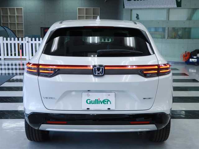 ホンダ ヴェゼル ハイブリッド e:HEV Z 千葉県 2025(令7)年 0.1千km プラチナホワイトパール 登録済未使用車/ホンダコネクトディスプレイ/ナビゲーション/フルセグTV/Bluetooth/AM/FM/USB/バックカメラ /BSM/ブラインドスポットモニター/LEDヘッドライト/LEDフォグランプ/ステアリングヒーター/ビルトインETC2.0/ハーフレザー /電動リアゲート/純正18インチAW/レーダークルーズコントロール/パドルシフト/ワイヤレス充電/USB充電/スマートキー×2本/取説/保証書