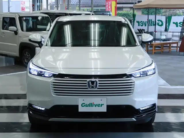ホンダ ヴェゼル ハイブリッド e:HEV Z 千葉県 2025(令7)年 0.1千km プラチナホワイトパール 登録済未使用車/ホンダコネクトディスプレイ/ナビゲーション/フルセグTV/Bluetooth/AM/FM/USB/バックカメラ /BSM/ブラインドスポットモニター/LEDヘッドライト/LEDフォグランプ/ステアリングヒーター/ビルトインETC2.0/ハーフレザー /電動リアゲート/純正18インチAW/レーダークルーズコントロール/パドルシフト/ワイヤレス充電/USB充電/スマートキー×2本/取説/保証書