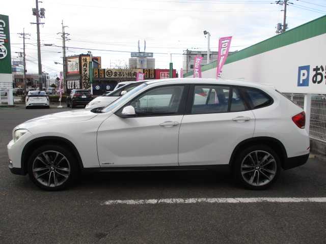 ＢＭＷ Ｘ１ sDrive 18i スポーツ 岡山県 2014(平26)年 8.3万km アルピンホワイトⅢ 純正ＨＤＤナビ/バックカメラ/ＤＶＤ再生可能/Ｂｌｕｅｔｏｏｔｈ/ＵＳＢ/コーナーセンサー/オートライト/純正フロアマット/純正18ＡＷ/スマートキー