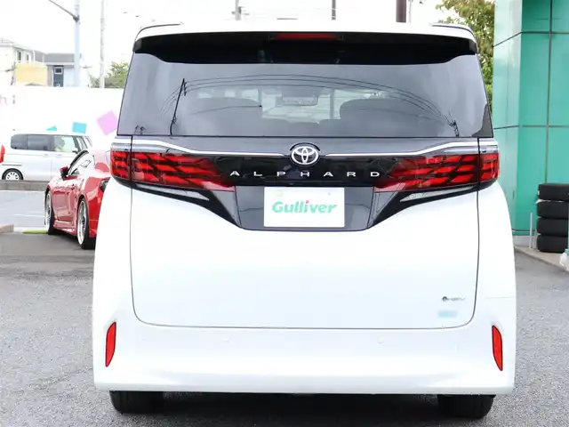 トヨタ アルファードハイブリット Z 神奈川県 2025(令7)年 0.1千km ホワイトパールクリスタルシャイン ユニバーサルステップ/左右独立ムーンルーフ/パワーサンシェード/デジタルインナーミラー/ワンオーナー/JBLスピーカー/純正メモリナビ/フルセグテレビ/バックカメラ/全周囲カメラ/ブラインドスポットモニター/ETC2.0/おくだけ充電/100V電源/革巻きコンビステアリングホイール/電動チルトテレスコピックステリング/ステアリングスイッチ/ステアリングヒーター/シートヒーター/エアーシート/225/60R18タイヤ/18インチ5本トリプルスポークスーパークロームメタリック塗装AW/快適温熱シート/マイコンプリセットドライビングポジションシステム(運転席)/助手席肩口パワーシートスイッチ/エグゼクティブパワーシート(2列目)/ウィンカーミラー/クルーズコントロール(追従走行あり)/ドアバイザー/プッシュスタート/パワーバックドア/両側パワースライドドア/純正LEDヘッドライト/純正フロアマット/コーナーセンサー前後