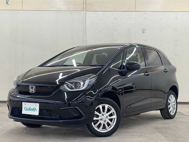 ホンダ フィット ホーム 道央・札幌 2022(令4)年 4.8万km クリスタルブラックパール /4WD//純正8インチメモリナビ：VXM-215VFEi/（ラジオ/CD/DVD/SD/BT/フルセグTV）//寒冷地仕様//フロントワイパーデアイサー//横滑り防止装置//バックカメラ//アイドリングストップ//純正ドライブレコーダー（前後型）//電動パーキングブレーキ//ビルトインETC//オートホールド//衝突軽減ブレーキ//レーダークルーズコントロール//レーンキープアシスト//コーナーセンサー//ステアリングリモコン//オートライト//オートエアコン//プッシュスタート//純正フロアマット//スマートキー//電動格納ミラー